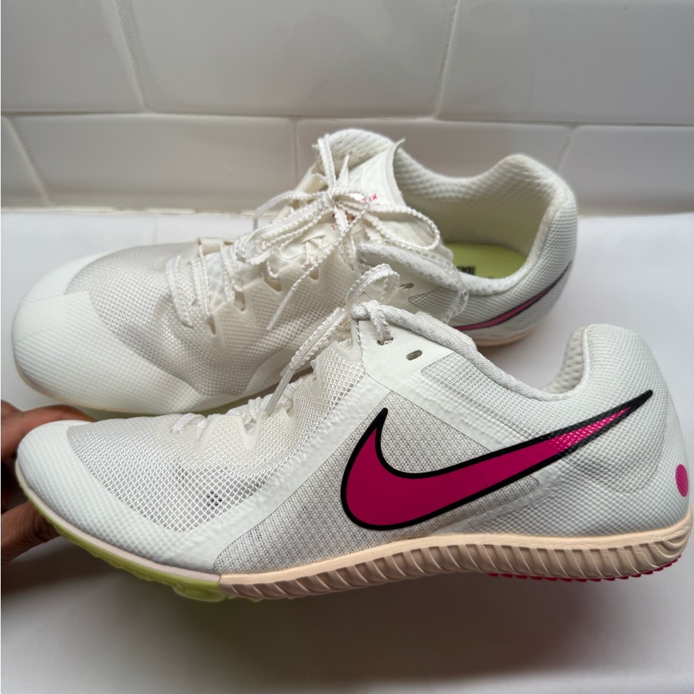 Nike Men Sz 11 /Women's Sz 12.5 White and Pink Athletic Muti Track&Field Shoes